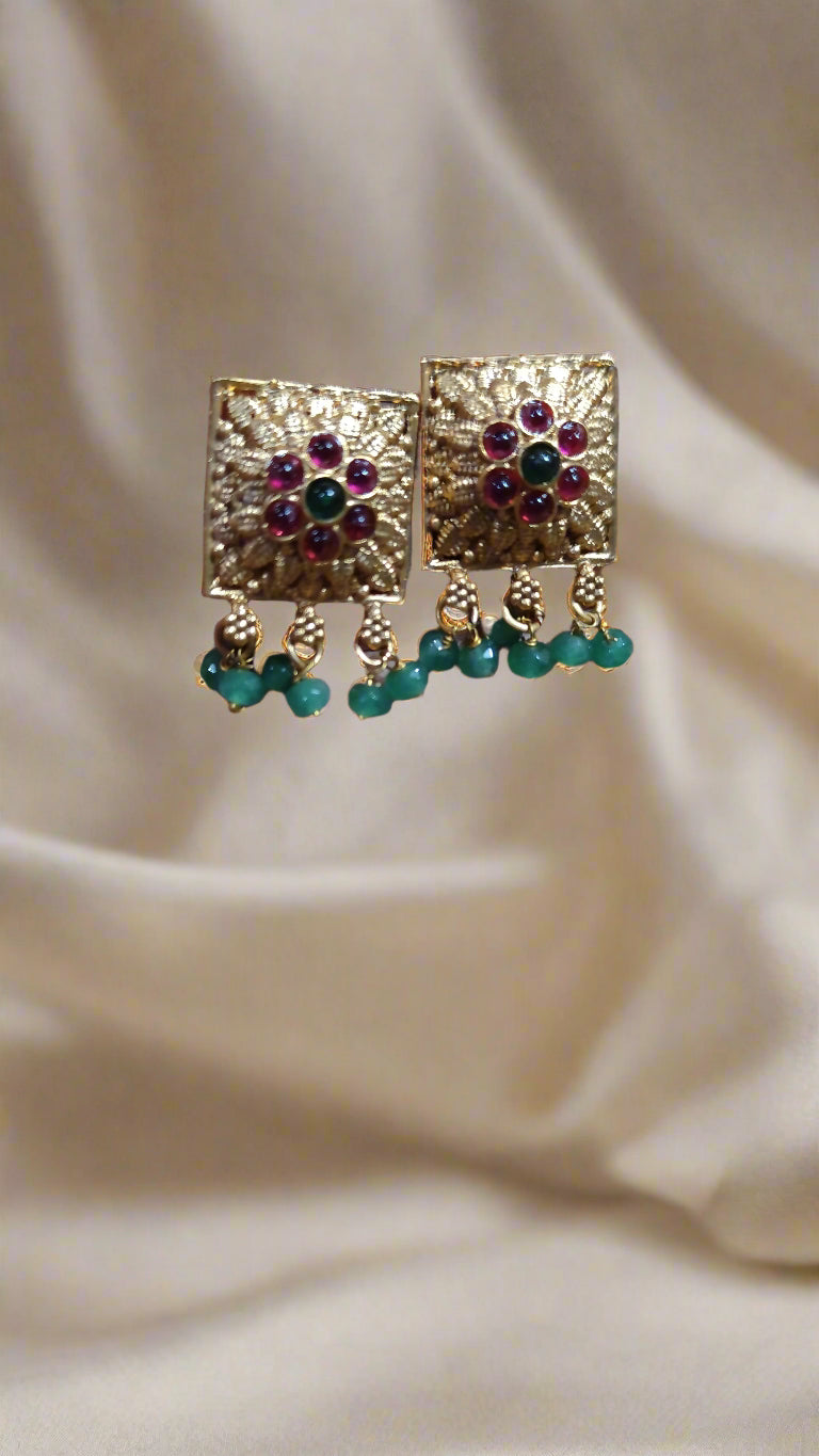 3 layered Gold Chain with pendent and ruby and Emerlad with beads